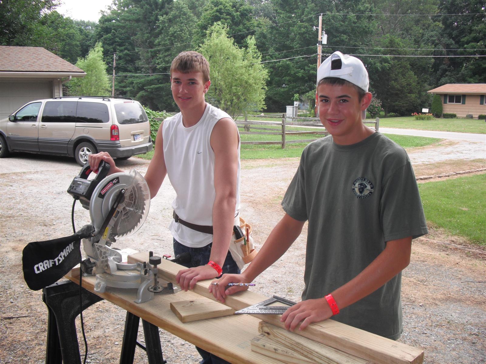 2 guys cutting board - crew 22 Butler